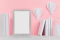 Fashion trendy office desk - white stationery, blank tablet touch computer and decorative origami aerostats on soft light pink. Royalty Free Stock Photo