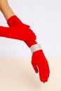 Fashion unrecognizable Lady in red retro gloves and bracelet. Minimalist elegant details style. Lookbook vintage aesthetics Royalty Free Stock Photo