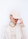 Fashion Urban Girl. Stylish Details Of Everyday Outfit. Casual Beige Aesthetics.Trendy Accessories Velvet Cap, Rings And Chaine.