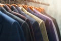 Fashion variety Colorful mens suits hanging in a store display Royalty Free Stock Photo