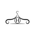 Fashion vector logo. Clothes hanger logo. Letter H logo. Tailor emblem. Wardrobe icon - Vector design