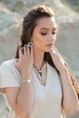 Beauty trends. Beautiful fashion woman with jewelry. Fashionable jewelry, earrings. Beautiful model girl. Beauty Royalty Free Stock Photo