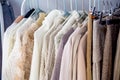 Fashion winter coats hanged on a clothes rack Royalty Free Stock Photo