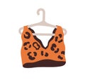 Fashion wireless bra. Girls brassiere with leopard print. Women sexy top. Seamless lingerie hanging on hanger. Modern