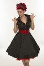 Fashion pinup girl in black polka dots dress.Vintage Royalty Free Stock Photo
