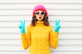 Fashion woman blowing red lips wearing colorful pink hat Royalty Free Stock Photo