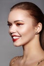 Fashion Woman Face With Perfect Smile. Female Model With Smooth Skin, Long Eyelashes, Red Lips, Healthy White Teeth Royalty Free Stock Photo