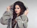 Fashion woman in grey fur coat, lady portrait. Luxury glamour gi Royalty Free Stock Photo