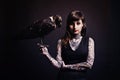 Fashion, woman and portrait with bird in studio for witchcraft or magic, mysterious and fantasy with punk tattoo. Person