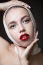 Fashion woman portrait with bright make-up. Long eyelashes and red glossy lips. Face Makeup Royalty Free Stock Photo