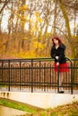 Fashion woman relaxing walking in autumn park Royalty Free Stock Photo
