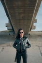 Fashion Woman with Sunglasses and Leather Jacket Rock Biker Style Royalty Free Stock Photo