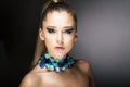 Luxury. Gorgeous Trendy Woman with Turquoise Necklace