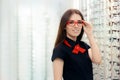 Fashion Woman Wearing Eyeglasses in Medical Optical Shop Royalty Free Stock Photo