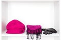 Fashion women accessories on white shelf in dressing room