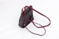 Fashion women leather dark red backpack isolated on a white background. Royalty Free Stock Photo