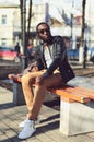 Fashion young african man wearing a sunglasses and black jacket Royalty Free Stock Photo