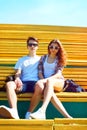 Fashion young couple teenagers sitting together Royalty Free Stock Photo