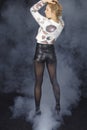 Fashion - Young woman with light pullover and black hotpant