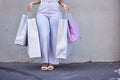 Fashion, zoom shopping bag or woman legs in street road for retail, luxury or designer gift clothes. Leg, model or rich Royalty Free Stock Photo