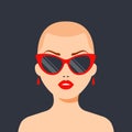 Fashionable bald girl with glasses and red lips