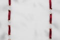 Fashionable beautiful background, red satin ribbon inserted in white satin fabric