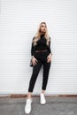 Fashionable beautiful young model woman in stylish black clothes Royalty Free Stock Photo