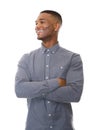 Fashionable black guy smiling with arms crossed