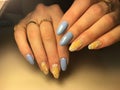 fashionable blue manicure stylish yellow design