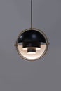 Fashionable chandelier with brass elements, black modern pendant lamp in loft style. Interesting hemispherical design