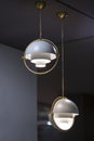 Fashionable chandelier with brass elements, gray modern pendant lamp in loft style. Interesting hemispherical design