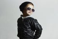 Fashionable child boy in sunglasses. winter style.Smiling Little boy Royalty Free Stock Photo