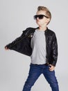 Fashionable child in leather coat.little boy in sunglasses Royalty Free Stock Photo