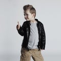 Fashionable child in leather coat.stylish little boy. Autumn fashion