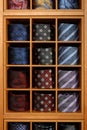 Fashionable collection of rolled-up ties. Royalty Free Stock Photo