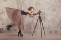 Fashionable confident  woman in body dress with leopard print, female model posing in studio with beton background. Vintage boots Royalty Free Stock Photo