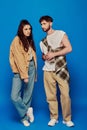 fashionable couple, casual wear, posing on