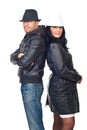 Fashionable couple in leather jackets and hats