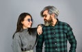 Fashionable couple posing. Enjoying spring time together. Street style. Today is a good day. Hipster couple. Bearded man Royalty Free Stock Photo