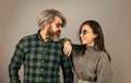 Fashionable couple posing. Enjoying spring time together. Street style. Today is a good day. Hipster couple. Bearded man Royalty Free Stock Photo