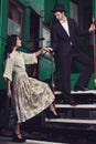 Fashionable couple posing on train car Royalty Free Stock Photo