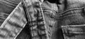 Fashionable denim clothing. Details and seams on rough denim. Black and white photography Royalty Free Stock Photo