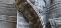Fashionable denim clothing. Details and seams on rough denim. Black and white photography Royalty Free Stock Photo