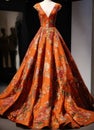 Fashionable evening orange summer dress on a mannequin. ai generative. ai generative