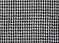 Fashionable fabric made of wool with pepita pattern in black and off-white