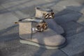 Fashionable female boots on the pavement Royalty Free Stock Photo