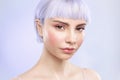 Fashionable girl with healthy ideal glowing skin, lavender hair and modern gentle make up