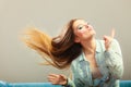 Fashionable girl with long hair blowing Royalty Free Stock Photo