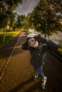 Fashionable girl rollerskating in the park Royalty Free Stock Photo