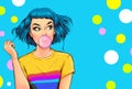 Fashionable girl with a stylish haircut inflates a chewing gum has amazed expression. Pop Art woman Royalty Free Stock Photo